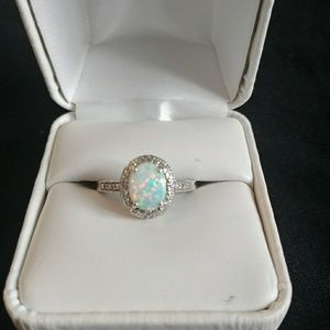Opal halo set ring. White gold